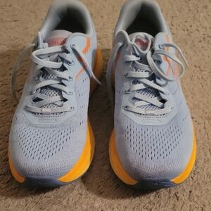 Skechers Light Blue Athletic Running Shoes with Yellow Accents